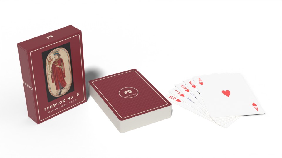 A poker deck, a royal flush and its tuck box