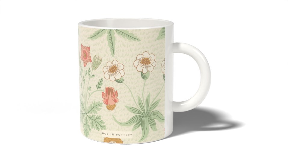 An 11 oz mug, its print stopping either side of the handle