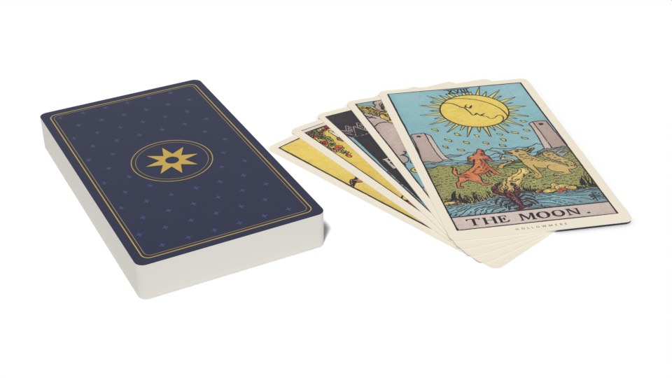 Tarot cards, fanned beside the deck